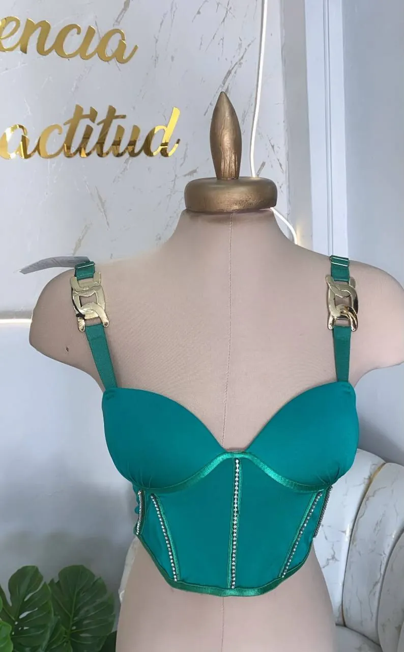 Corsé verde esmeralda, en maniquí